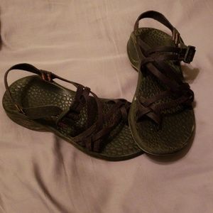 Black and pink Chacos